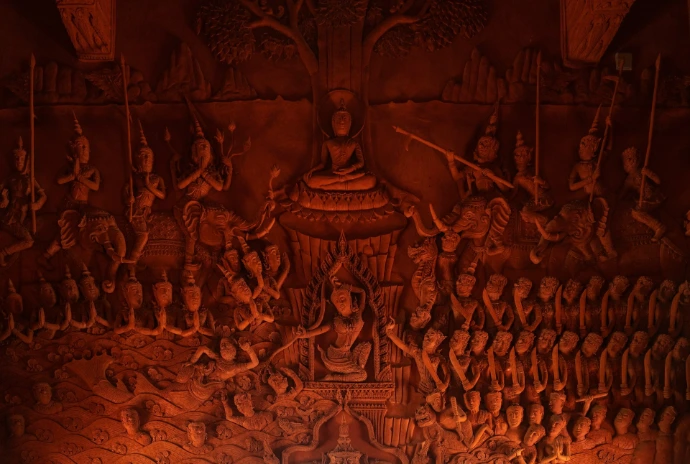 a wall with a lot of carvings on it